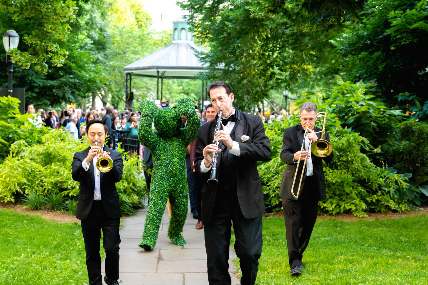 A brass band plays music as gala guests enter the International House for the event