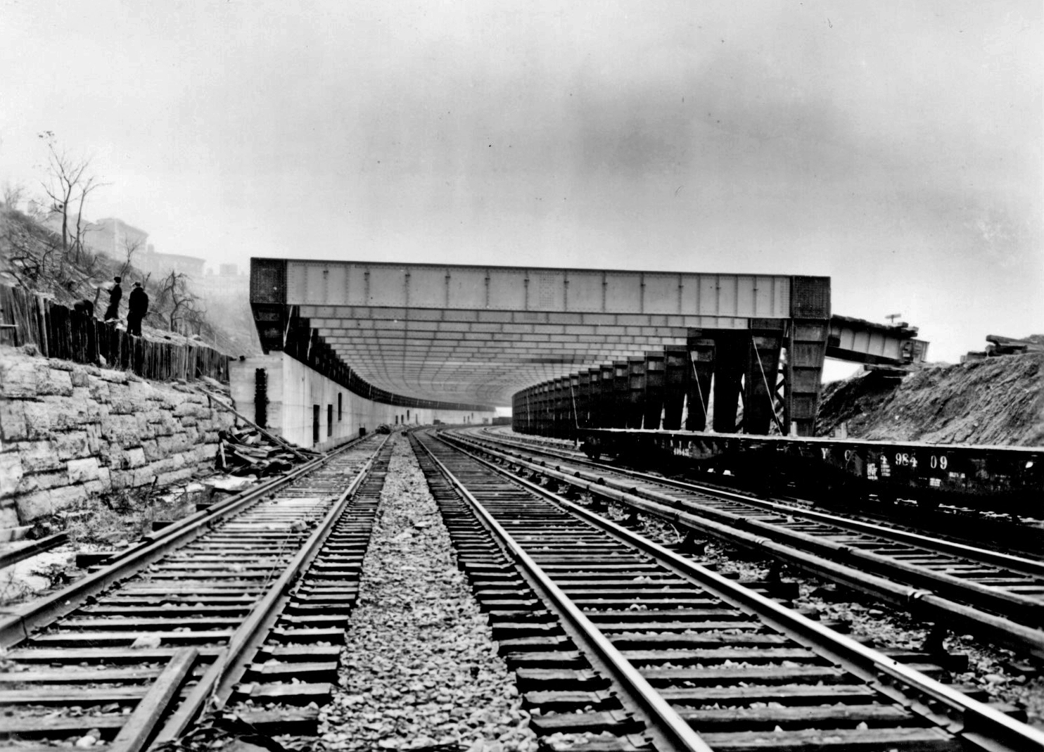 Construction taking place to cover the railroad tracks in 1937