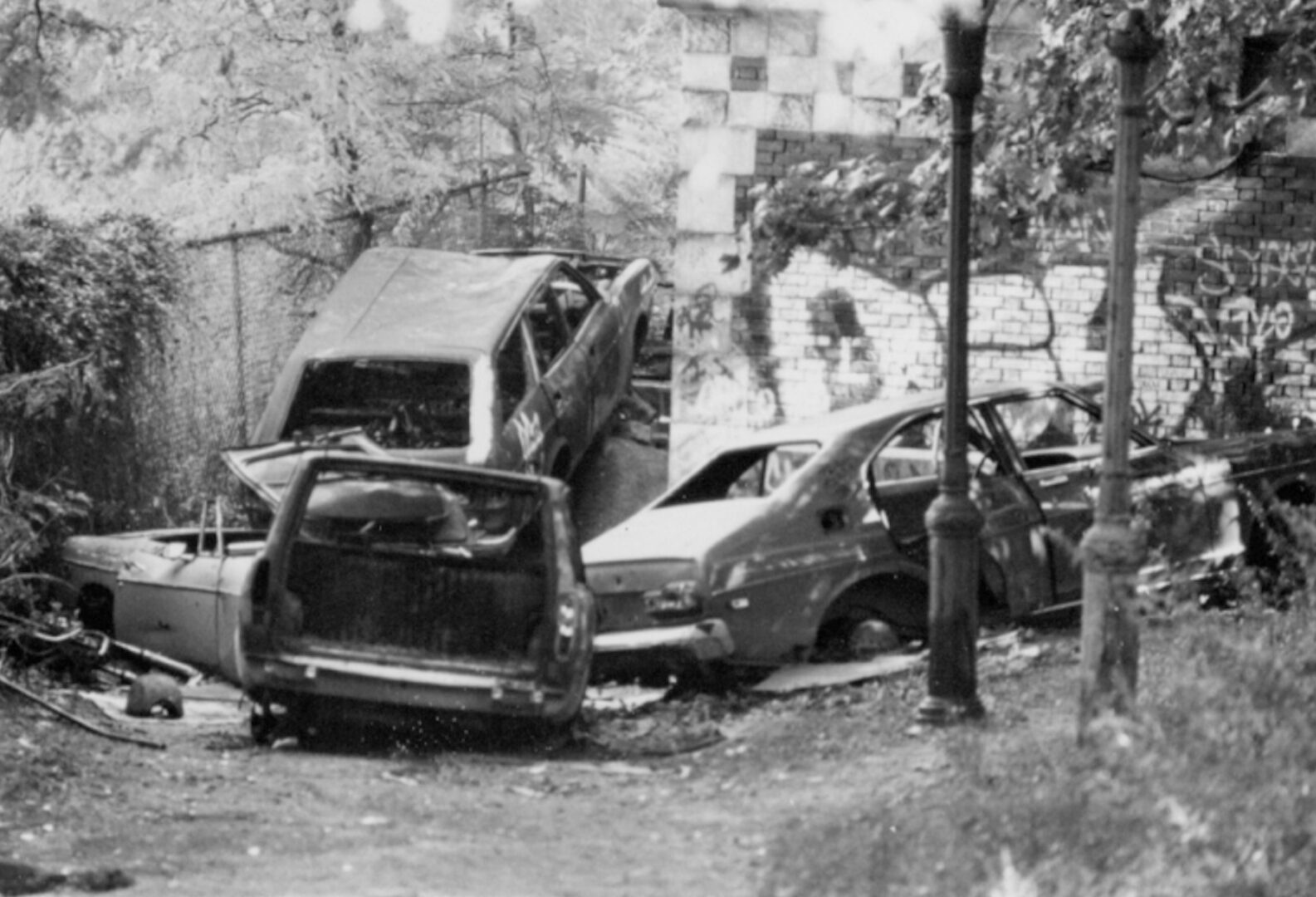 Abandoned cars accumulate in a corner of the Park in the 1980s