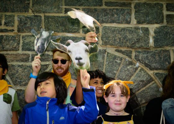 Kids enjoy the welcome event as the goats arrive in Riverside Park